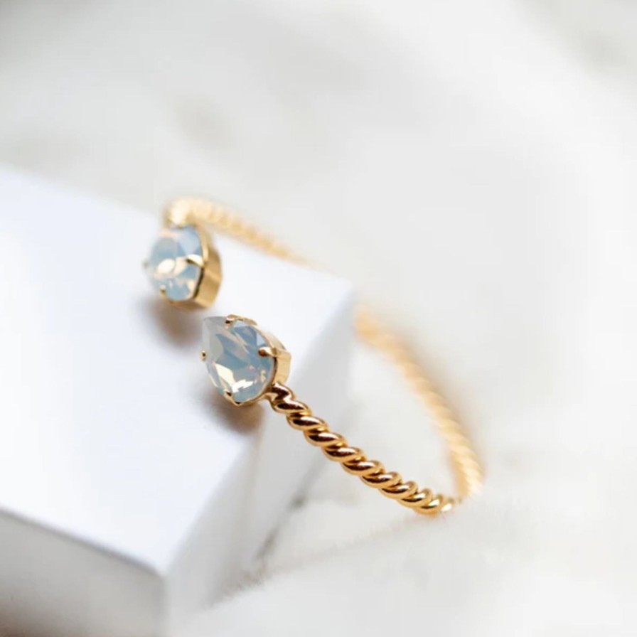 Caroline Svedbom Caroline Svedbom Gold Mini Drop Twist Bangle - White Opal Wholesale